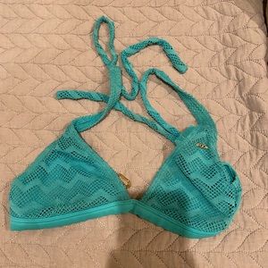Blue designed roxy swimsuit top.